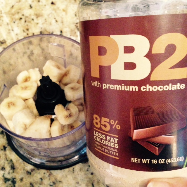 Mix frozen banana chunks with PB2 and almond milk